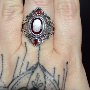 Large Sterling Silver Gothic ring (size 9) with 3 Garnet Stones